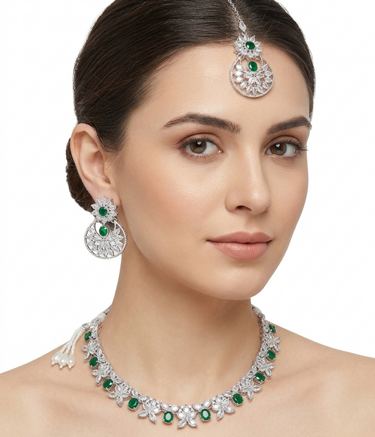 Model wearing the artificial American Diamond choker, earrings, and maang tikka set