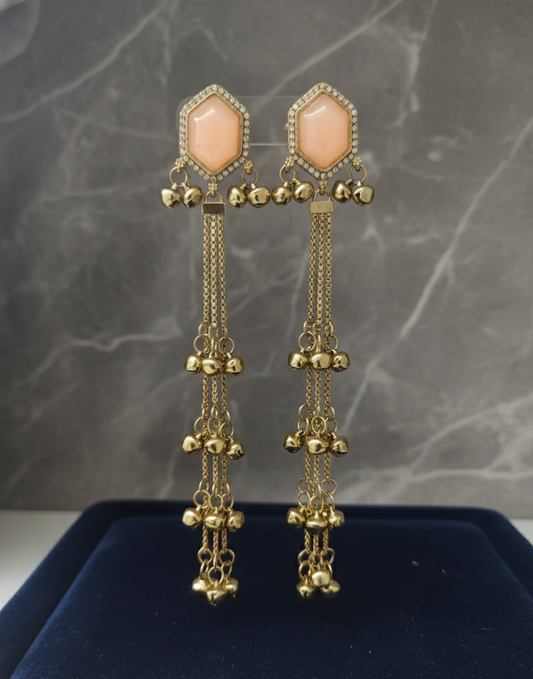 Close-up view of premium artificial Peach Hexagonal Stone Gold Tassel Drop Earrings Elegant Statement Jewelry by Innovate Art Impex.