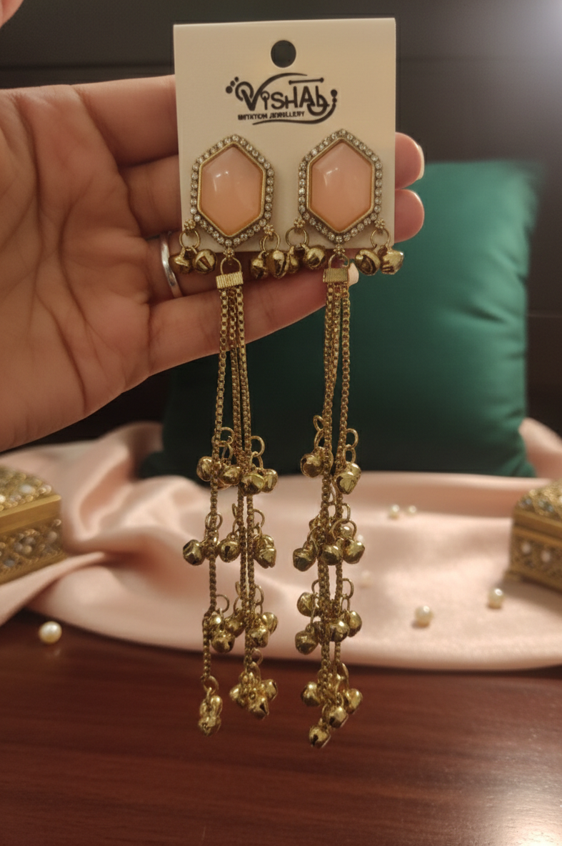 Close-up view of premium artificial Peach Hexagonal Stone Gold Tassel Drop Earrings Elegant Statement Jewelry by Innovate Art Impex.