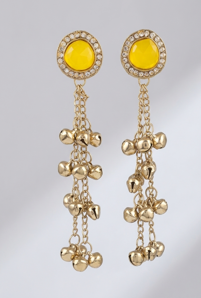 Close-up view of premium artificial Vibrant Yellow Stone & Gold Bell Tassel Statement Earrings Gold Plated Kundan Drop Earrings with Ghungroo Tassels β Traditional Fusion Long Chain Hangings for Women & Girls by Innovate Art Impex.