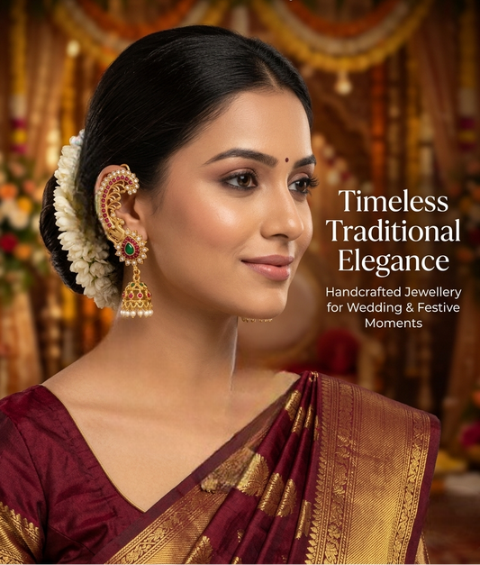 Indian model wearing INNOVATE ART IMPEX antique gold peacock ear cuff jhumka earrings with a maroon silk saree.