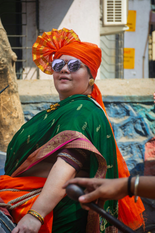 Woman in traditional indian attire with a turban