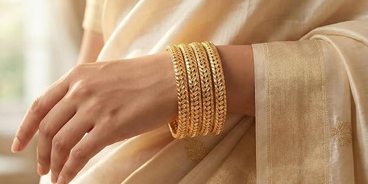 Close-up view of premium artificial Innovate Art Impex Traditional Bengali Gold Tone Alloy Bangles Set of 4 for Women | Ethnic Indian Chudi Kada Jewelry for Girls | Bridal & Wedding Accessories | Daily Bangle Bracelet Pack by Innovate Art Impex.