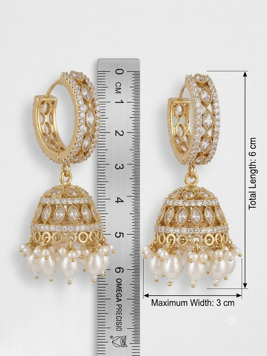 Pair of gold-toned hoop jhumka earrings placed next to a measuring ruler showing a total length of 6 cm and a maximum width of 3 cm.