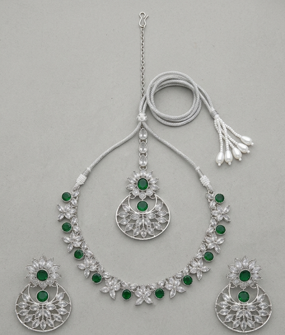 Top-down view of the complete artificial green stone necklace set against a neutral background.