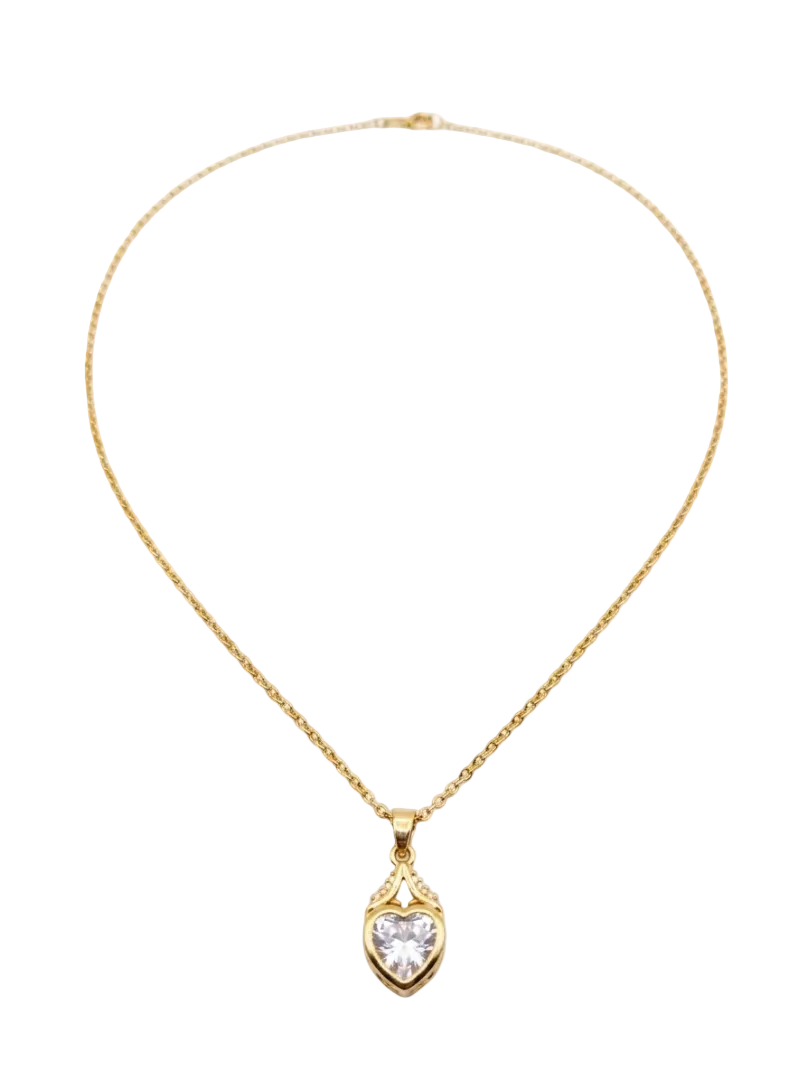 Close-up of the Vaidika Royal Heritage gold-toned necklace featuring a sparkling heart-shaped American Diamond pendant on a white background.