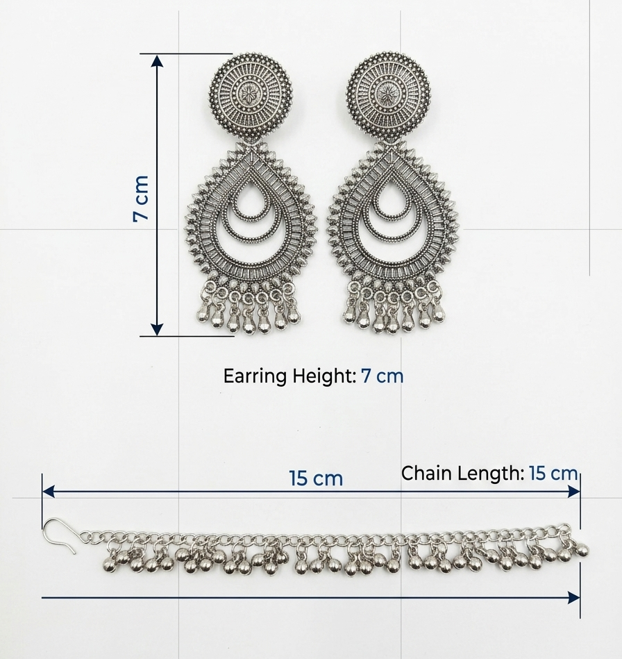 Silver-toned traditional Indian jhumka earrings with a matching chain, shown with dimension lines indicating a height of 7 cm and a chain length of 15 cm.