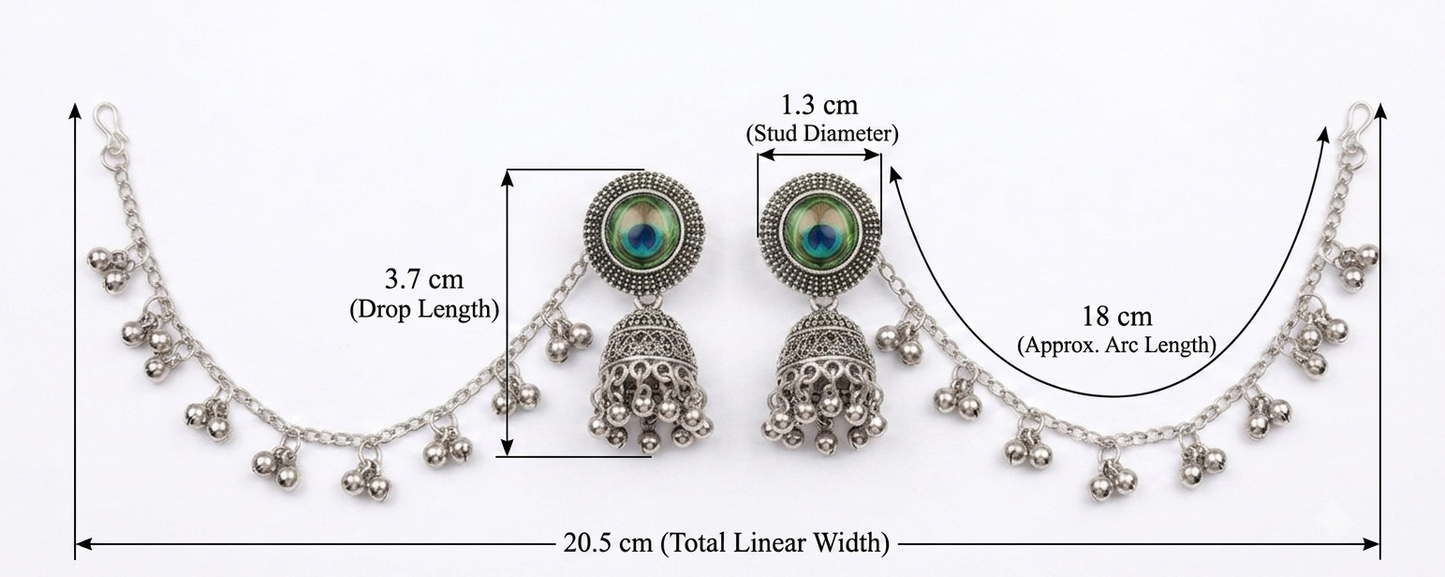 Silver-toned Indian jhumka earrings with dangling bell chains, shown with measurement arrows and labels on a white background.