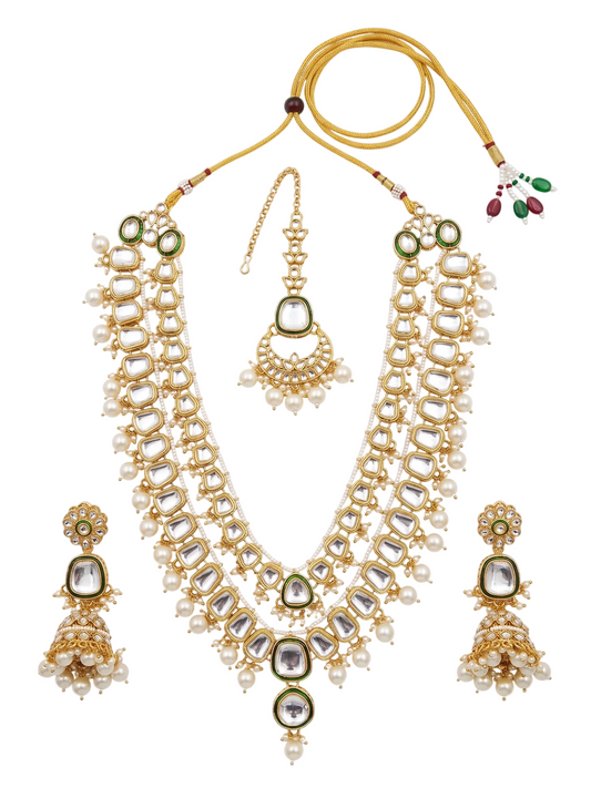 Complete artificial Kundan multi-strand necklace set including matching jhumka earrings and maang tikka, featuring green enamel borders and faux pearl drops