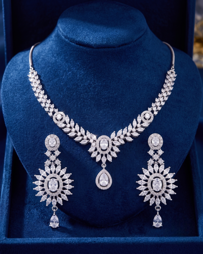 Technical measurement diagram of an artificial American Diamond necklace set detailing a 46 cm unclasped chain length, 4.3 cm central pendant drop, and 4 cm earring length.