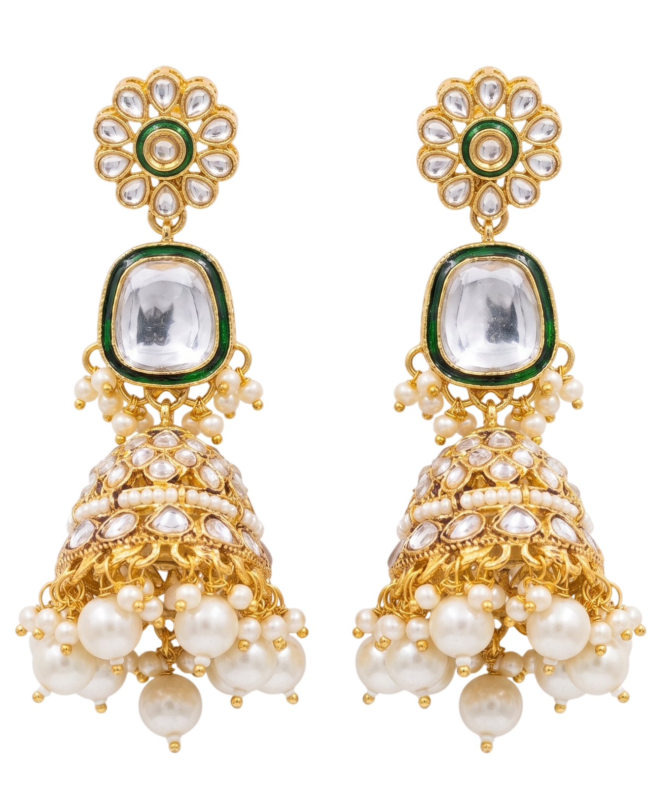Close-up detail of the imitation clear stones, green enamel trim, and faux pearl tassels on the artificial Kundan jewelry pieces.
