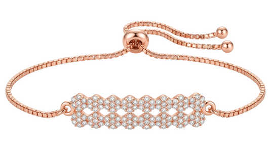 Close-up studio shot of the rose gold adjustable bolo bracelet, highlighting the intricate cubic zirconia honeycomb bar and polished slider clasp.