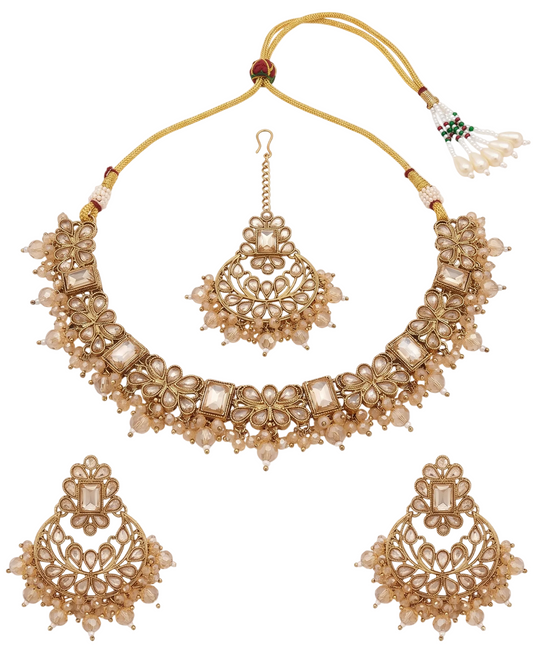 Complete flat-lay view of the antique gold-toned artificial kundan choker necklace set with matching chandbali earrings and maang tikka.