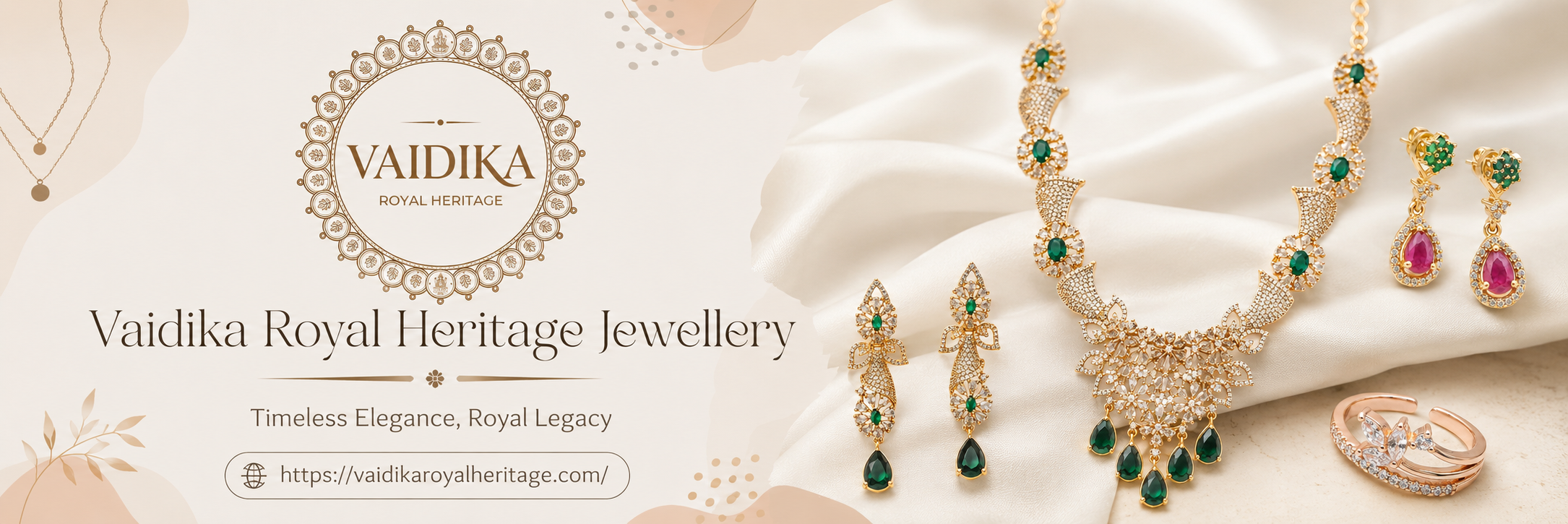 Vaidika Royal Heritage Jewellery promotional banner featuring a gold-toned necklace, matching earrings, and rings with green and pink stones, arranged on draped satin fabric beside the Vaidika logo and brand text.