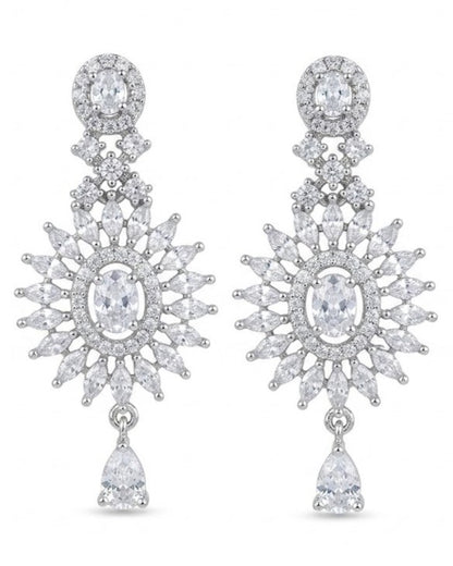 Close-up of a pair of artificial white finish drop earrings featuring a central oval stone, a marquise stone halo, and a bottom teardrop dangle.